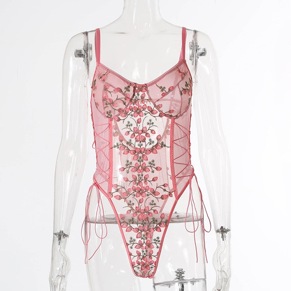 Floral embroidery detail on lace-up teddy bodysuit